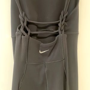 Black Nike one piece shorts , soft spandex material, unique back
